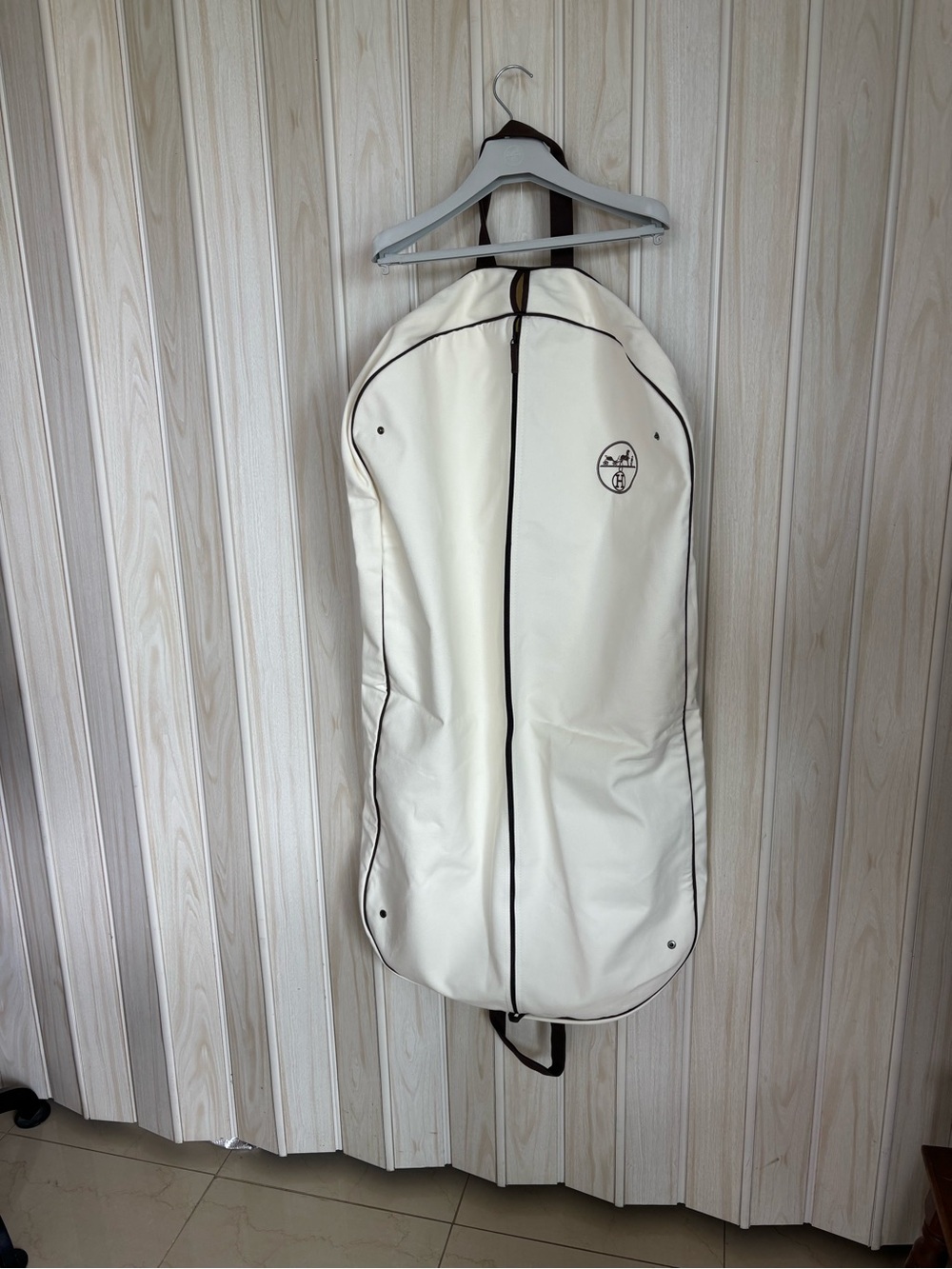 Hermes AUTHENTIC Cream Garment Bag with Brown Trim , and hanger.